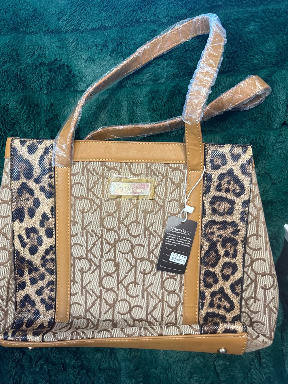Calvin Klein Tan Logo Tote with Leopard Trim. Brand new